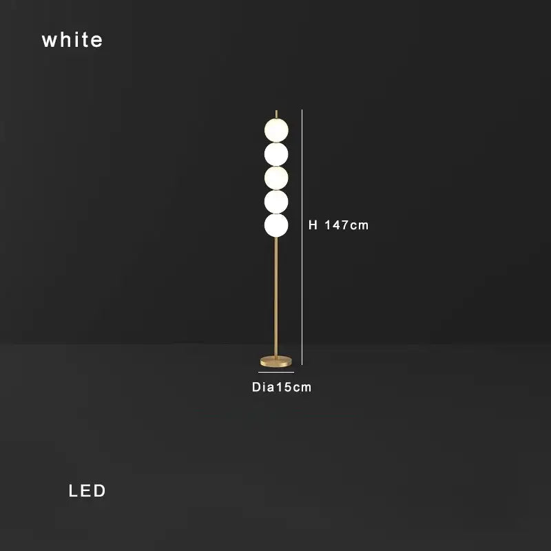Modern brass floor lamp with five white spherical bulbs and gold-toned metal stand ideal for living room decorbites brass floor lamp