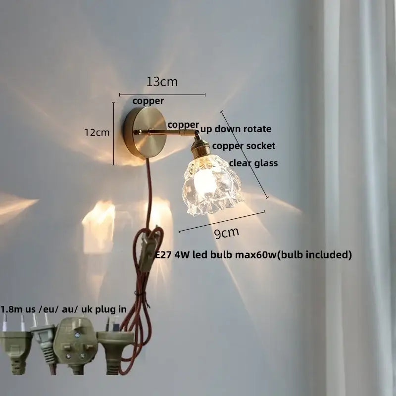 Modern brass floral wall sconce with copper finish clear glass shade and adjustable arm for stair lighting decorbites clear glass