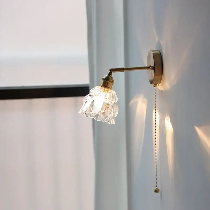 Modern brass flower glass base led wall sconce with faceted crystal shade and pull chain for bedroom decorbites glass base