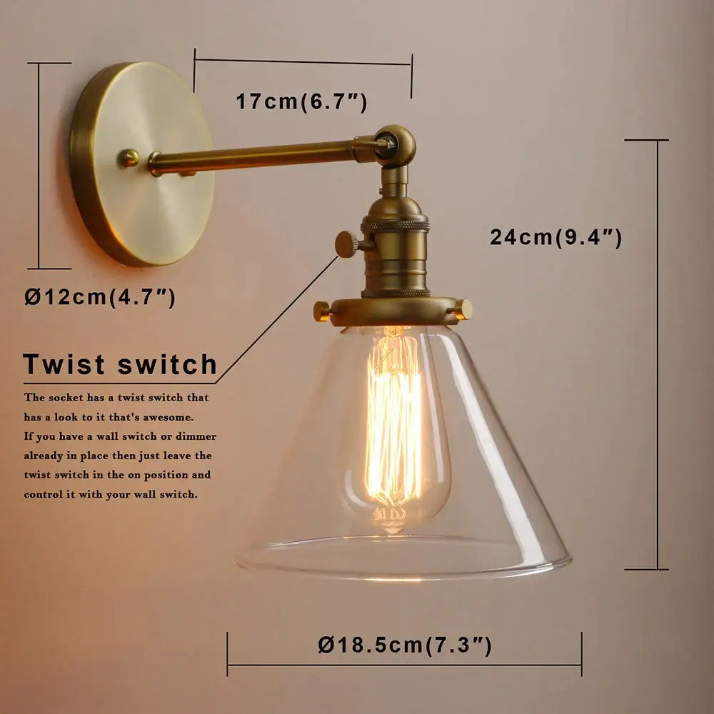 Modern brass funnel glass wall lamp with clear bell-shaped shade and exposed Edison bulb for bedroom lighting decorbites funnel glass wall
