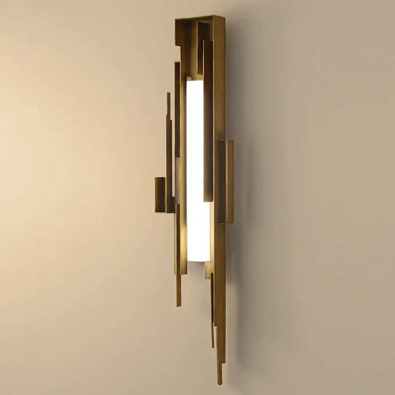 Modern brass geometric elegant wall lamp featuring layered rectangular bars framing a frosted glass panel for living room use