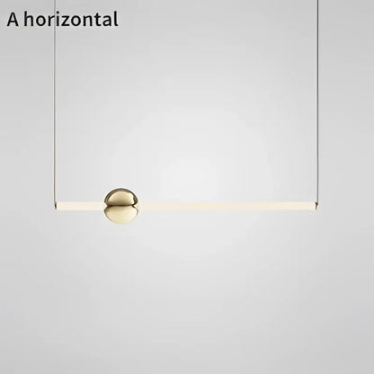 Modern brass geometric glass pendant light with sleek gold sphere and soft white glow for dining room illumination