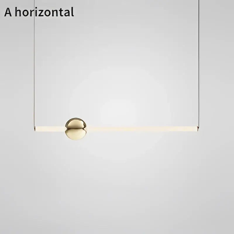 Modern brass geometric glass pendant light with sleek gold sphere and soft white glow for dining room illumination