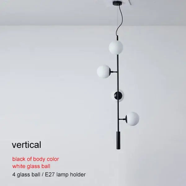 Modern brass glass ball chandelier with black vertical pendant and four white glass spheres for living room decorbites brass glass