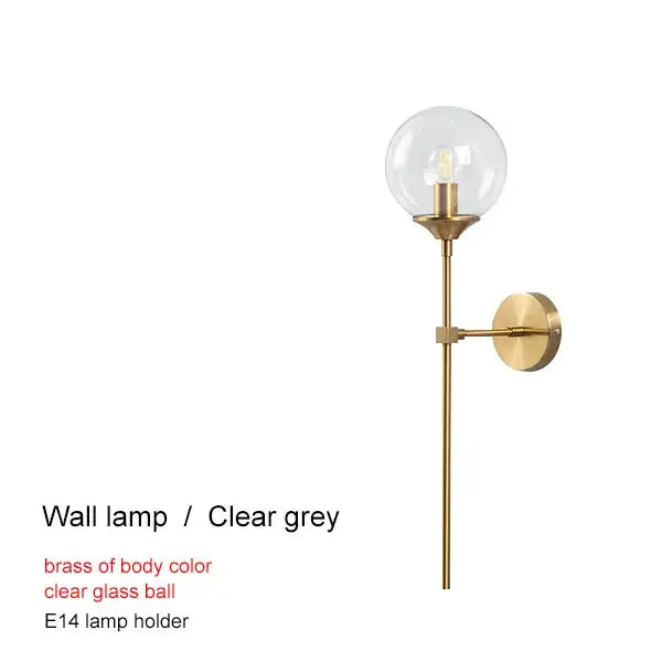 A sleek modern brass glass ball chandelier with clear globe and e14 bulb holder for living room decorbites brass glass