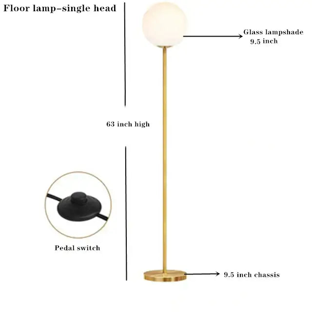 Modern brass floor lamp with gold finish glass ball lampshade and circular base ideal for bedroom and study decorbites glass ball