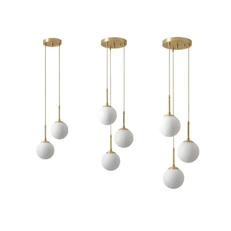 Modern brass glass ball led chandelier with gold finish and frosted white spherical shades for dining room decorbites glass ball