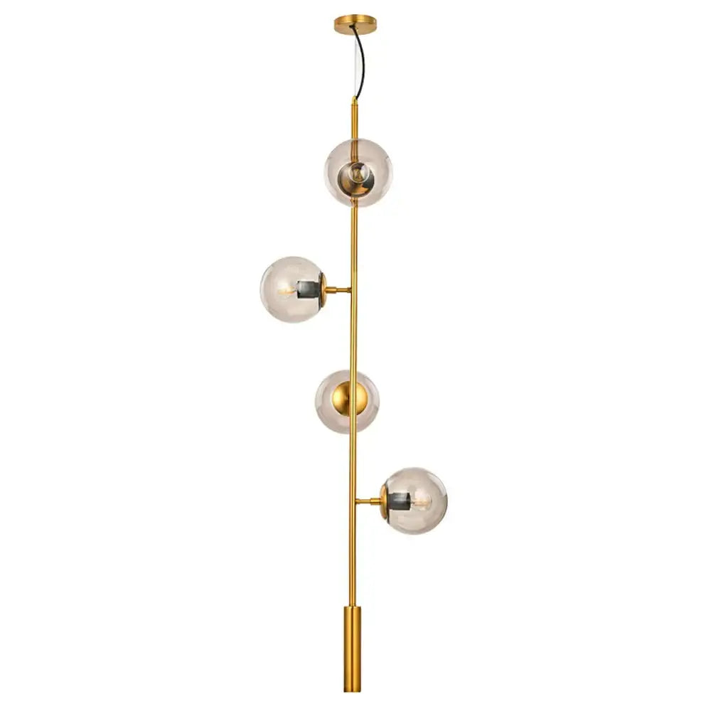 Modern brass glass ball led chandelier features four clear glass globe bulbs on a gold-toned rod for dining room decorbites glass ball