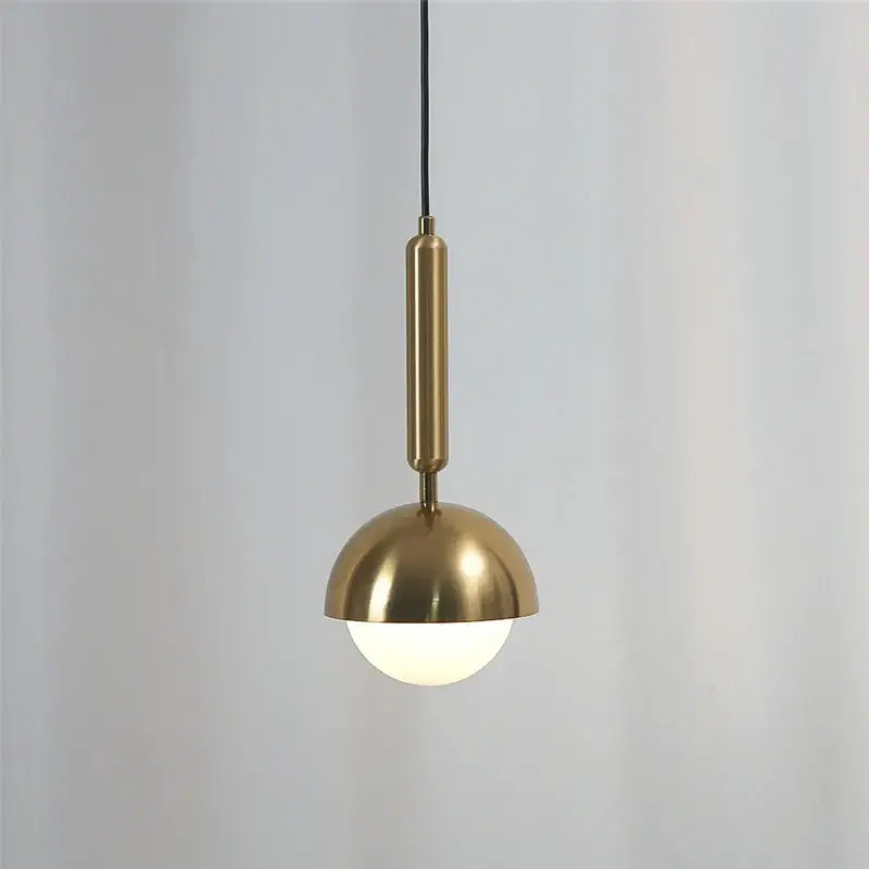 Modern brass glass ball led pendant chandelier featuring a brass-finished stem and dome shade for dining room decorbites