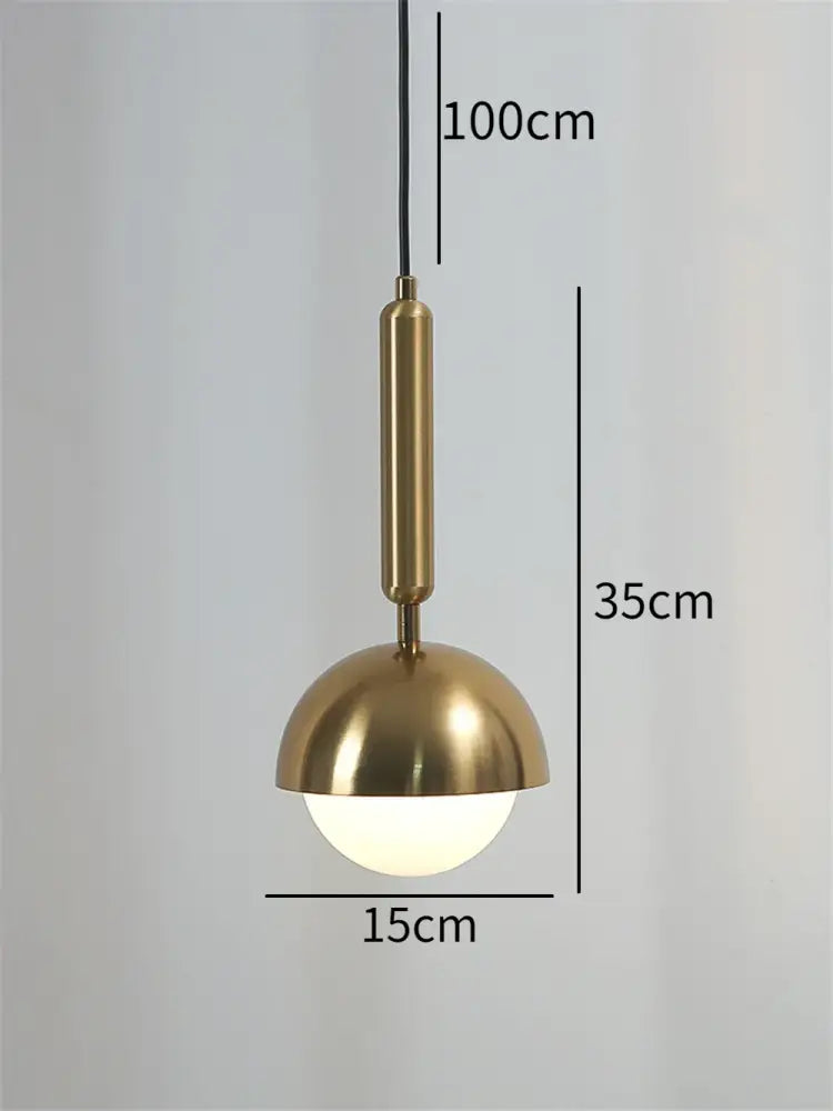 Modern brass glass ball led pendant chandelier featuring a brass finish with a sleek spherical glass globe