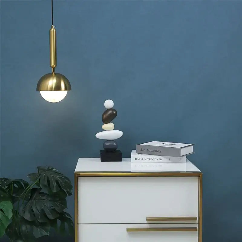 Modern brass glass ball led pendant chandelier with polished brass finish and spherical glass globe for dining room decorbites