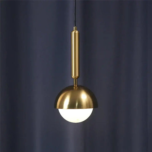 A modern brass glass ball led pendant chandelier with a polished stem and dome shade for dining room decorbites decor