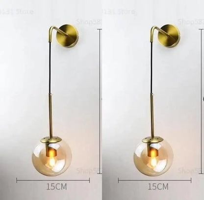 Modern brass glass ball led wall light with clear glass globe and exposed bulb for bedroom decorbites wall light