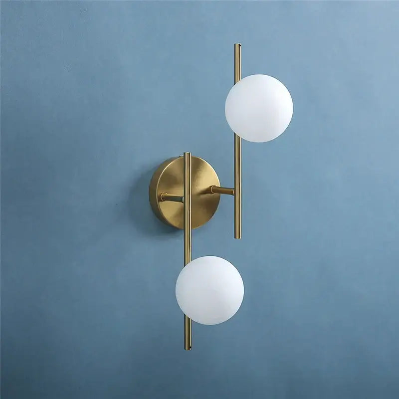 Modern brass glass ball led wall light with two frosted white spherical glass shades for bedroom decorbites glass ball