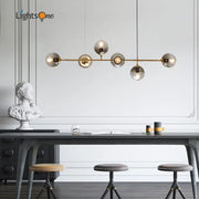 Modern brass glass ball metal pendant lights with five spherical globes ideal for kitchen bar decorbites glass ball design