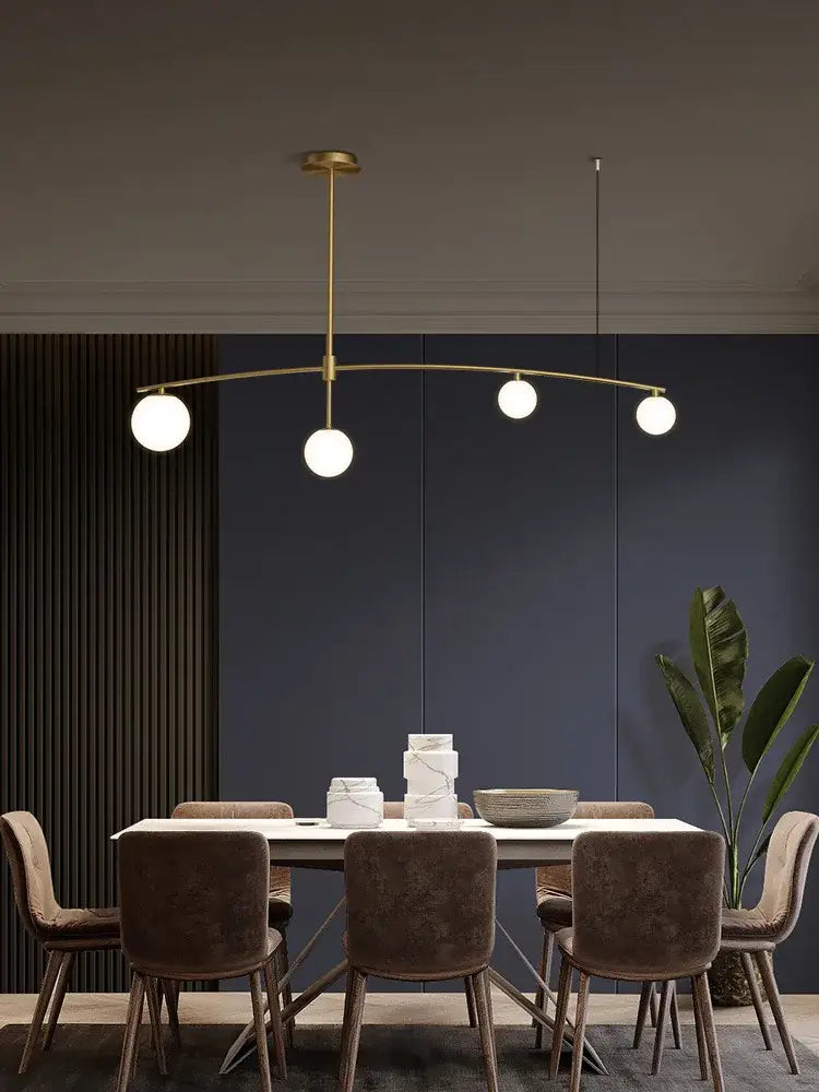 Modern brass glass ball pendant chandelier with three white glass bulbs perfect for dining room arc lighting decorbites glass ball