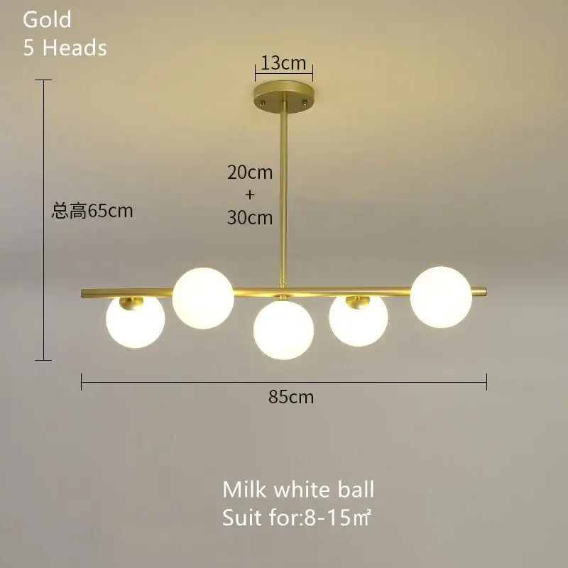 Modern brass glass ball pendant chandelier with gold finish and five milk white glass bulbs for dining room decorbites glass ball