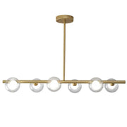 Modern brass glass ball pendant chandelier with six clear glass globe bulbs in a linear design for dining room decorbites glass ball
