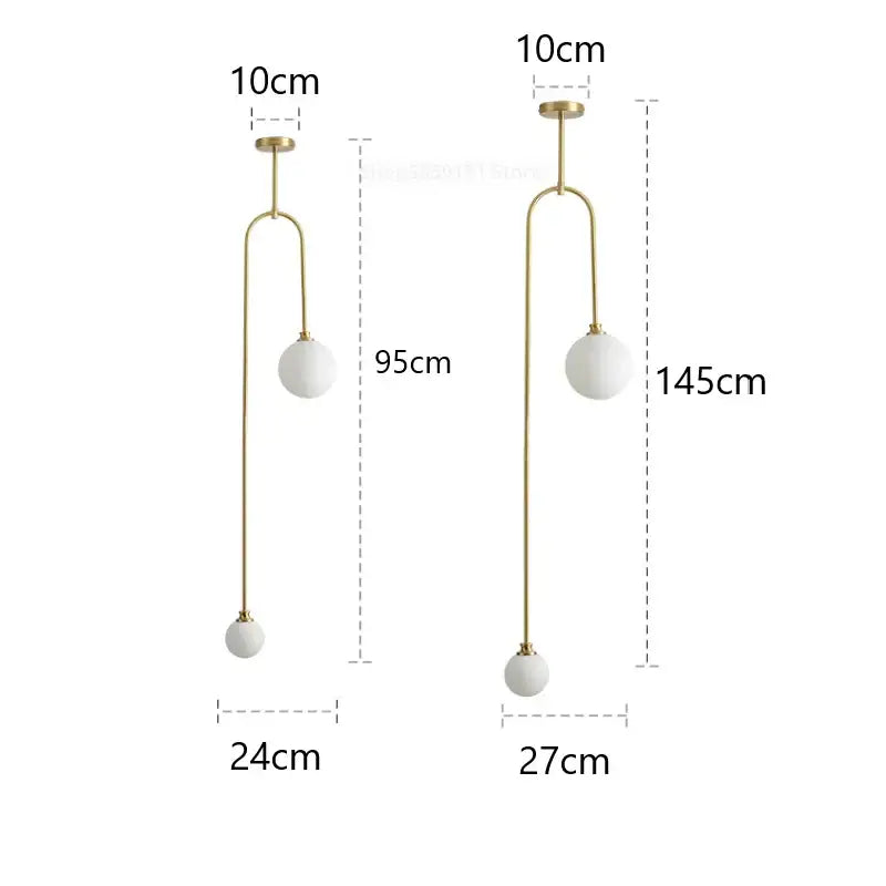 Modern brass decorbites glass ball pendant lights with gold-toned arms and two white frosted glass ball globes for dining room decor