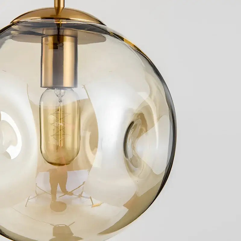 Modern brass glass ball pendant lights set of 2 with amber glass and exposed filament bulb for kitchen decorbites glass ball pendant