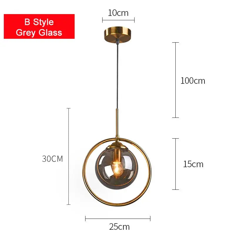 Modern brass glass ball pendant set featuring a B style grey glass pendant light with gold-toned metal frame decorbites glass ball