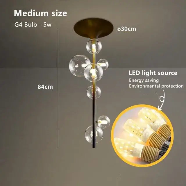 Modern brass glass bubble pendant light with clear glass globes and slender rod for dining room decorbites glass bubble