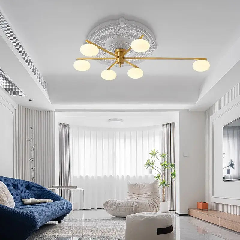 Modern brass glass ceiling lamp with five frosted globes gold-toned decorbites brass glass living room lighting