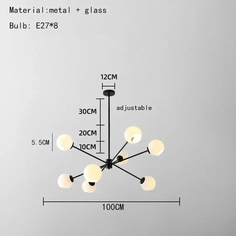 Modern brass glass chandelier with black metal frame and eight frosted globe bulbs for living spaces and dining room