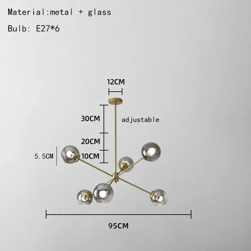 Modern brass glass chandelier with six spherical bulbs and clear glass shades ideal for dining room and living spaces