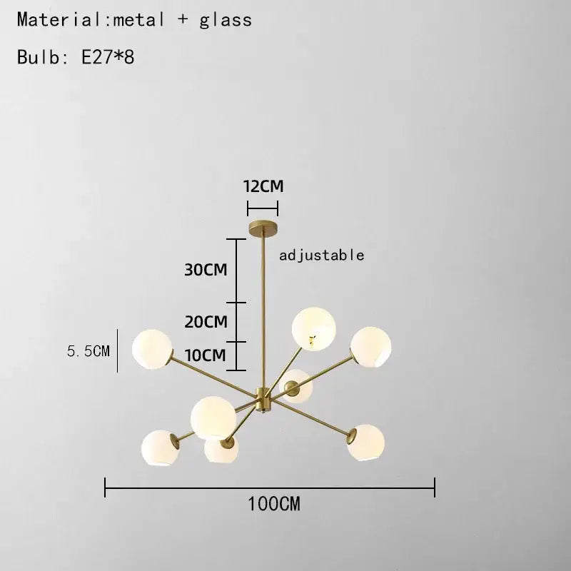 Modern brass glass chandelier with eight frosted globe bulbs and clear glass shades for elegant living spaces and dining rooms