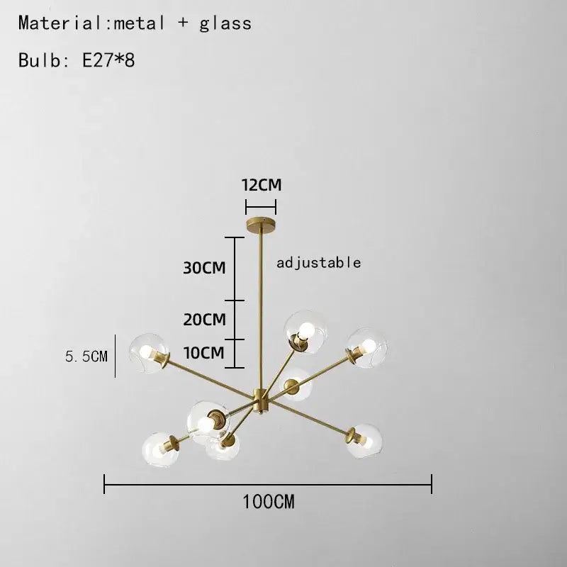 Modern brass glass chandelier with clear glass shades and eight spherical bulbs for elegant living spaces and dining rooms