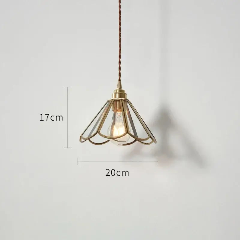 Modern brass glass copper led pendant lights featuring a delicate petal design with exposed filament bulb for dining room use