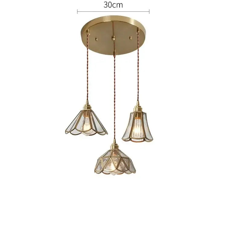 Modern brass-finished three-light pendant lights with clear petal-shaped glass copper led shades and braided cord suspensions