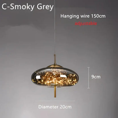 Modern brass glass cord pendant light with smoky grey glass dome, warm led filament, and brass-colored hanging wire
