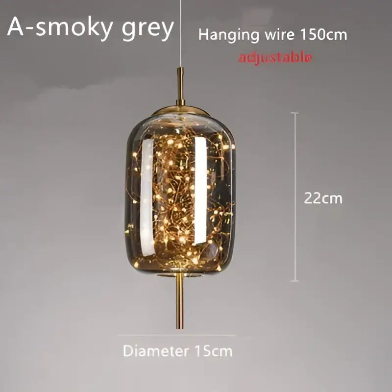 Modern brass glass cord pendant light with smoky grey glass, gold metal accents, warm fairy lights, ideal for dining room