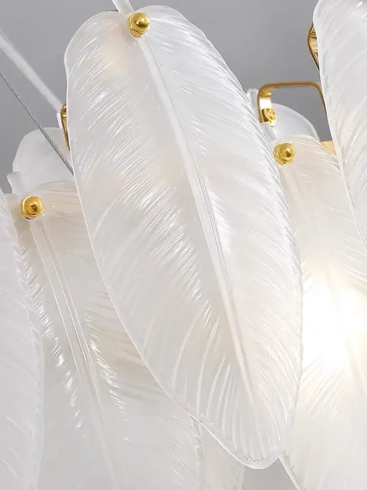 Elegant white glass feather chandelier with gold-toned hardware modern brass glass feather chandelier for dining room