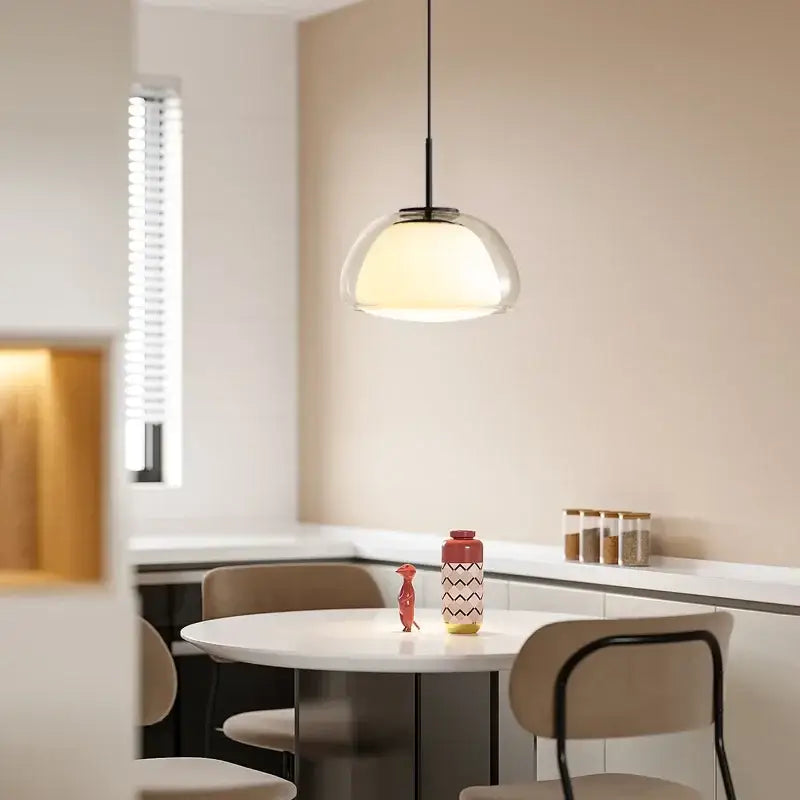 Modern brass glass jelly pendant lamp with translucent dome-shaped glass jelly pendant and black metal fixture for dining room decorbites pendant lamp