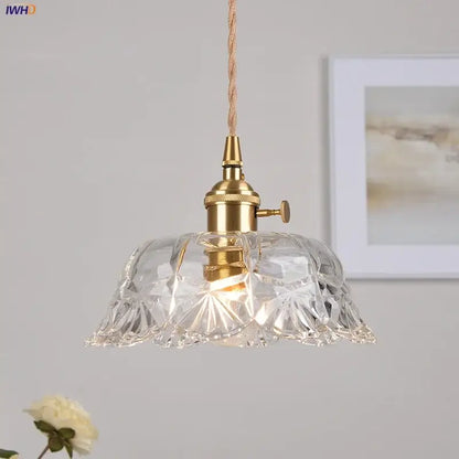 Modern brass glass led pendant light with clear cut glass and brass fixture featuring an edison-style bulb for dining room decorbites brass glass