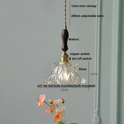 Modern brass glass led pendant light with a clear fluted glass shade and dark walnut wooden handle for dining room decorbites brass glass
