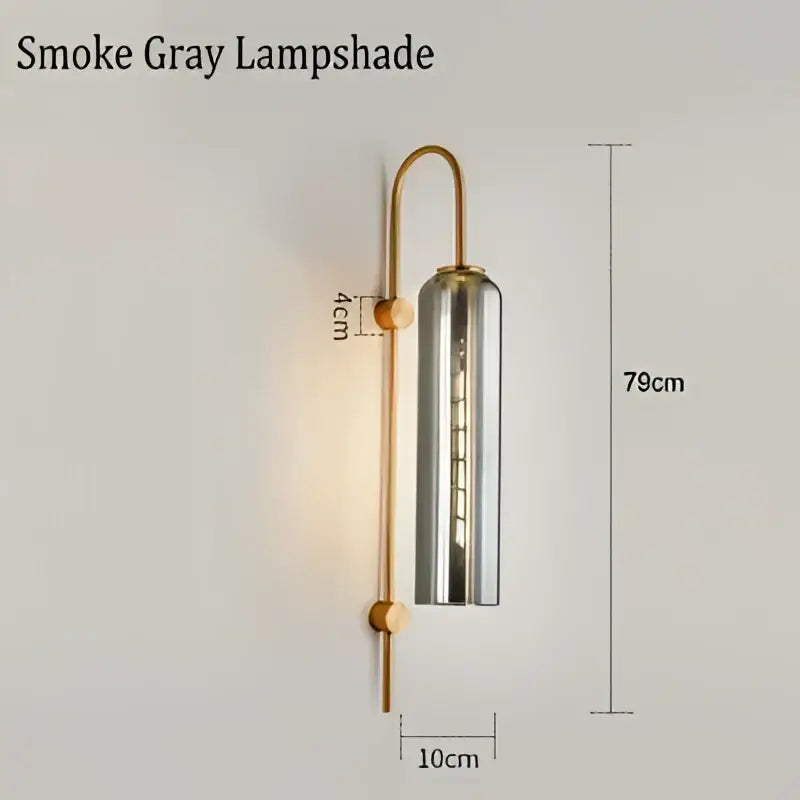 Modern brass glass sconce wall lamp with smoke gray cylindrical lampshade and brass metal arms for living room wall lamp
