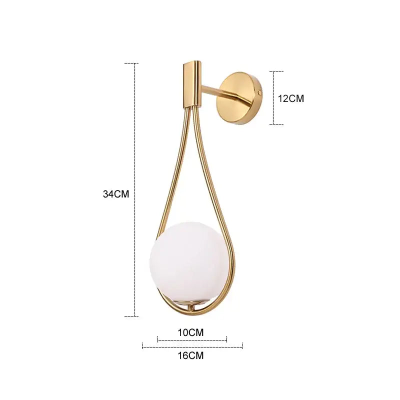 Modern brass glass wall lamp with gold-toned teardrop frame and opaque white glass shade for bedroom lighting decorbites brass glass