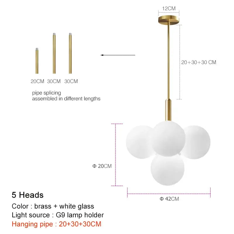 Modern brass globe pendant lamp with five frosted glass spheres clustered for dining room illumination