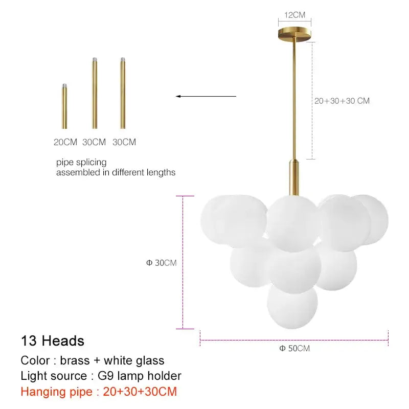 Modern brass globe pendant lamp with 13 frosted white glass spheres ideal for dining room lighting