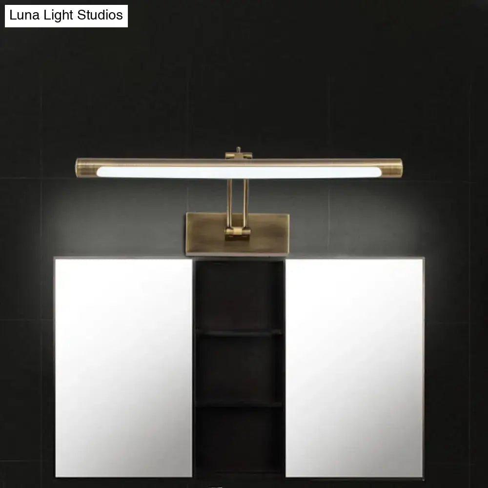 Modern brass gold finish rectangular led wall lamp with sleek design mounted above bathroom vanity mirrored cabinets