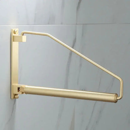 Modern brass gold wall clothing rack with sleek metal design for bedroom decorbites brass gold organizer