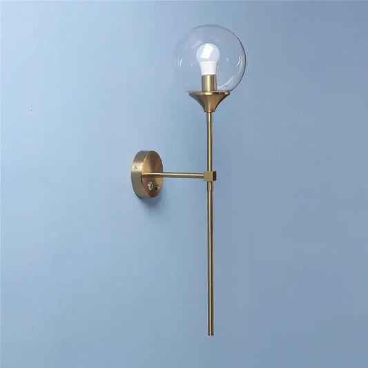 Modern brass golden glass ball wall lamp with brass finish and clear globe housing exposed bulb for bedroom decorbites wall lamps