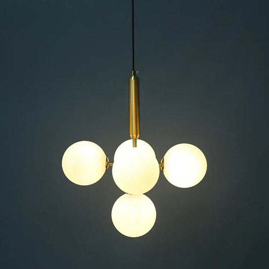 Modern brass golden glass balls ceiling light with four frosted glass globes decorative for dining room decorbites golden glass