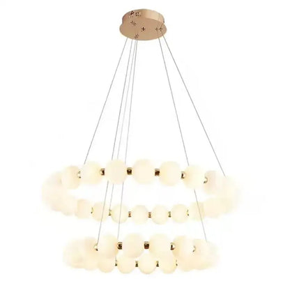 Modern brass led pendant light with frosted glass spheres and gold-toned accents for living room decorbites brass led pendant