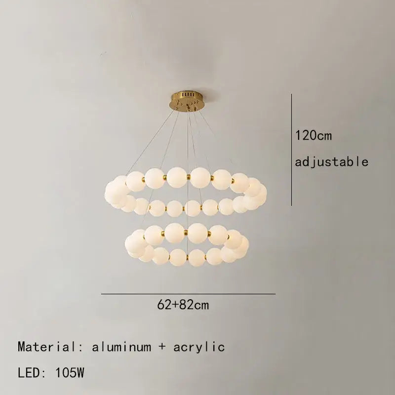 Modern brass led pendant light with frosted spheres and gold-toned aluminum frame for living room decorbites brass led