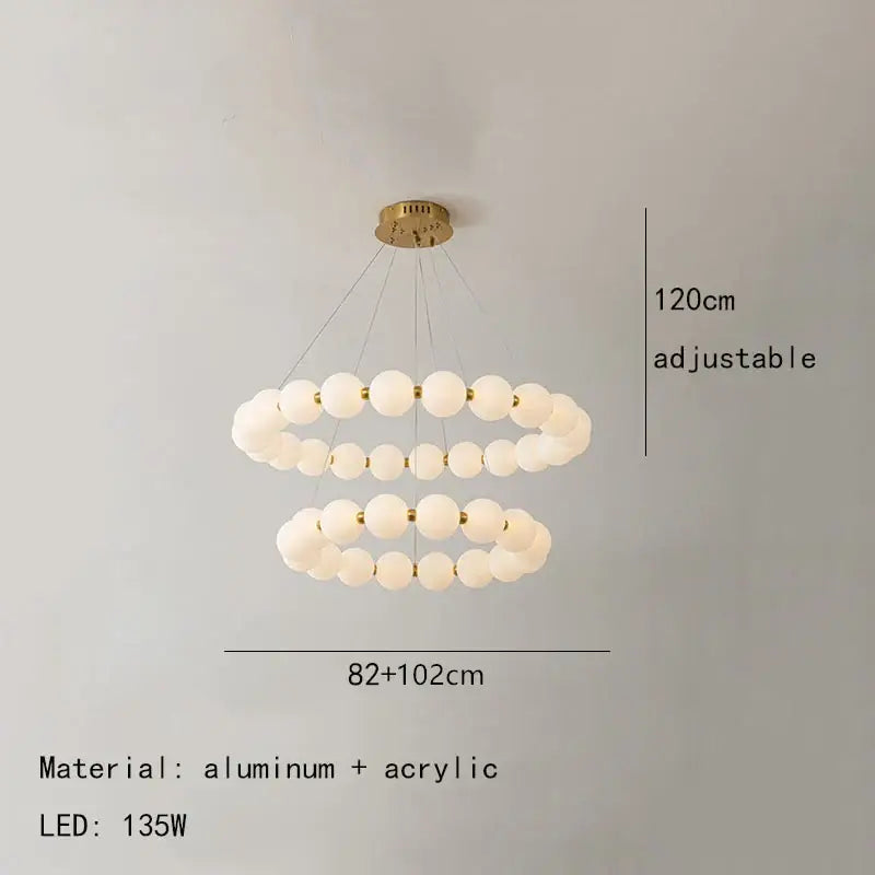 Modern brass led pendant light with frosted spheres features two concentric rings and gold-toned aluminum mount for living room decorbites brass led pendant